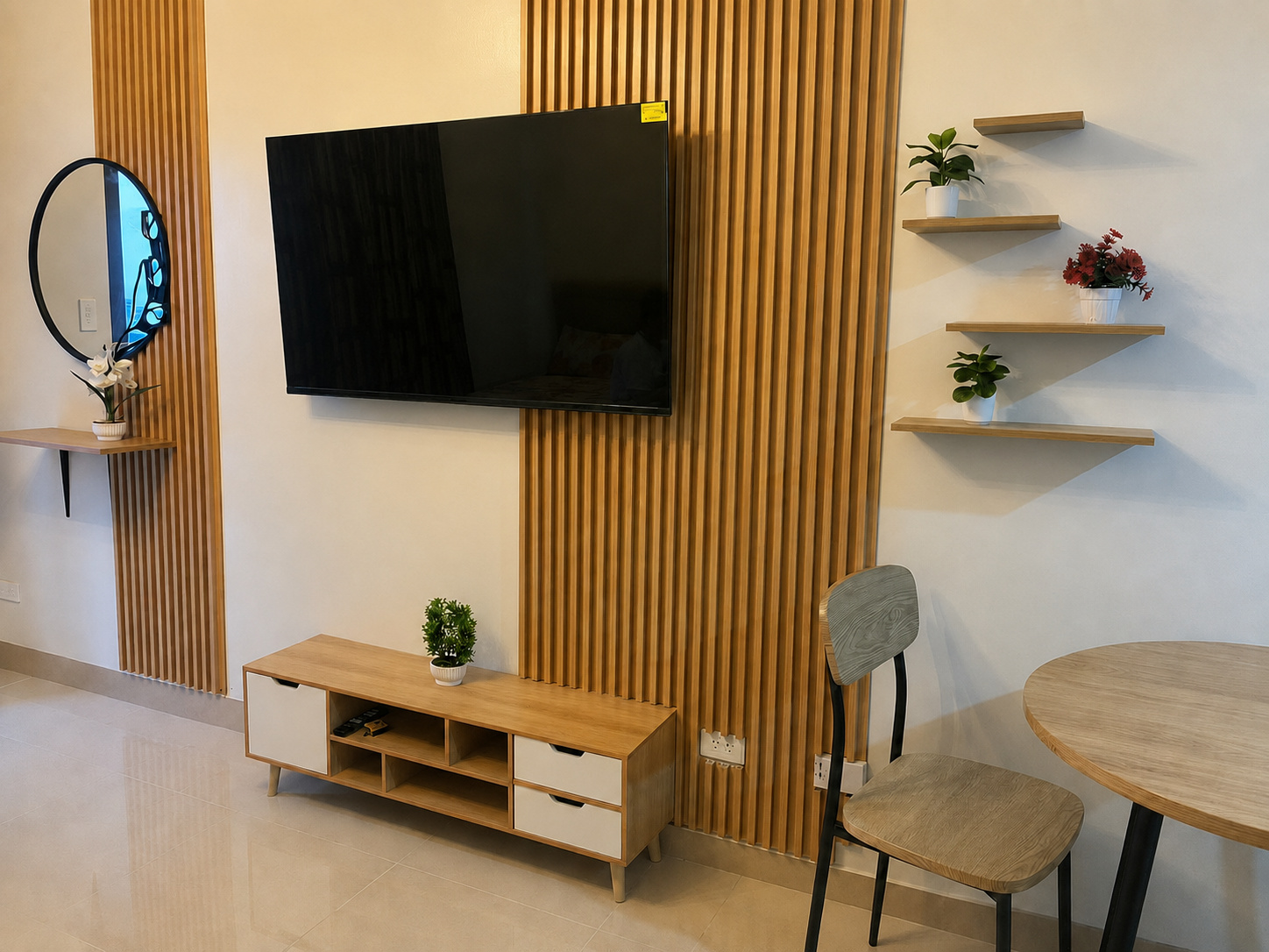 Wall-mounted Smart TV with timber feature panels, console, and display shelves